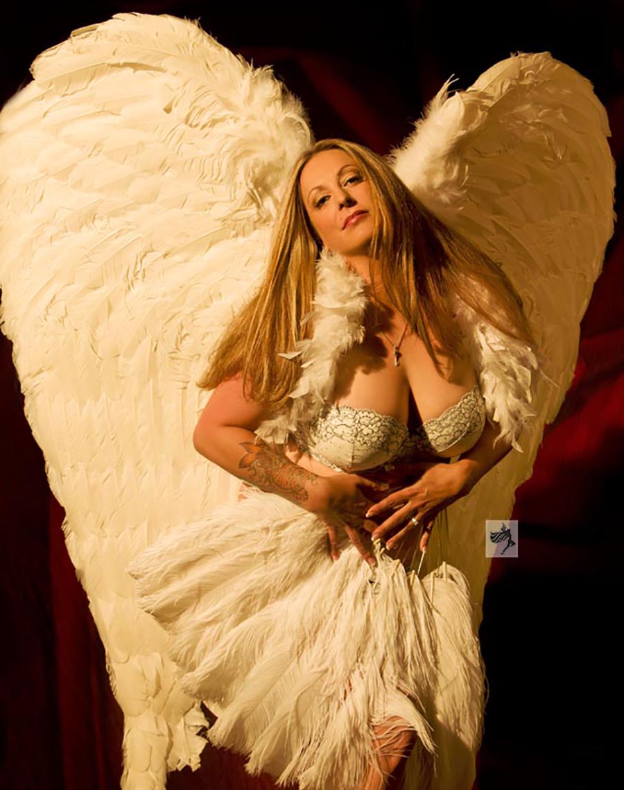 Angel woman wearing wings boudoir by Inner Spirit Photography